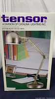 Photo of box for Tensor incandescent pharmacy desk lamp from Pittsburgh Collection, showing model 16579-001 and image of lamp on packaging