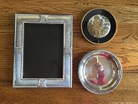 Photo showing all three items: silver plated 5x7 frame, Birks Regency plate, and hand-painted porcelain picture.
