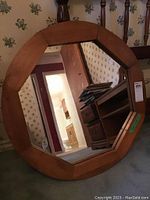 Full front view of the 28x28 wood framed octagonal mirror showing the overall shape and frame.