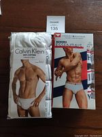 Photo showing Calvin Klein 6-pack briefs and Tommy Hilfiger 4-pack briefs with packaging and branding visible.