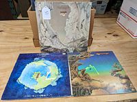 Three vintage rock LP record albums from the group Yes: Relayer, Fragile, and Yesterdays, shown with cover art visible.