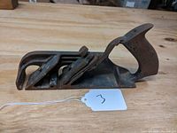 Side view of a Stanley No. 78 Duplex Rabbet Plane showing shape and handle.