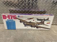 Front of sealed Lindberg B-17G Flying Fortress model kit box featuring color illustration of bomber plane and title.