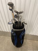 Full view of golf set showing clubs in the golf bag
