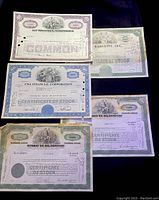 Photo showing front side of five stock certificates from A&E Industries, Corvette Inc, CNA Financial Corporation, Sunray DX Oil Company, and Bray Oil Company