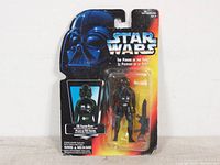 Front view of the sealed TIE Fighter Pilot figure packaging showing Star Wars branding and figure inside blister pack.