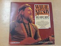 Front cover of the Willie Nelson vinyl LP 'His Very Best' deluxe two record set, showing image of Willie Nelson and list of featured songs.