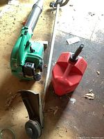Gas can, Hitachi blower, Echo string trimmer on floor showing complete lot