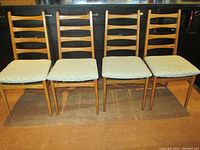 Front view of four chairs in a row