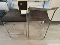 Two stools side-by-side front view showing seat and frame