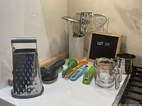 Photo of entire lot showing the front and left side with all kitchen items organized on a counter corner.