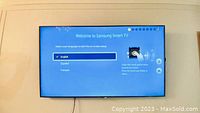 TV turned on showing "Welcome to Samsung Smart TV" setup screen