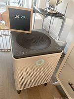 Full unit shown from front-top angle with LOT 23 sign