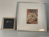 Wide shot of framed vintage Popeye comic book with LOT 52 sign