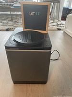 Front view of the Vitamix Foodcycler unit on floor showing exterior housing and power cord.