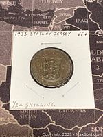Reverse side showing coat of arms with three lions and year 1933.