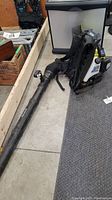 Full view of Ryobi BP42 backpack blower with blower tube and harness