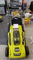 Top view of Ryobi lawn mower with handle assembled