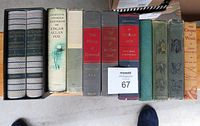 Rows of vintage hardcover books including Edgar Allan Poe, John Steinbeck's Grapes of Wrath, and others with decorative spines and bindings.