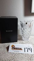 Photo of Waterford Grant crystal vase with its original black box showing brand name Waterford.