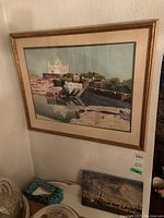 Framed print by J. H. J. Dix showing a white domed building on terraced stone walls along a body of water with reflection.