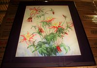 Front view of oil painting depicting honeysuckle flowers with green leaves, framed in a wood frame with purple mat and glass cover.