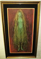 Front view of framed lithograph showing gold-tone frame and black mat