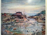 Close-up of the framed art print showing a harbor scene with boats and buildings at sunset or sunrise.