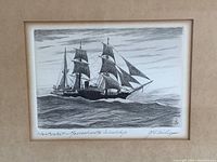 Close up of the signed and titled sketch showing the ship, signature, and inscription on mat.