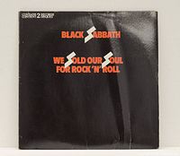 Front view of the Black Sabbath album cover titled 'We Sold Our Soul For Rock and Roll' showing black cover with red and white text.