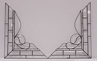 Pair of leaded etched glass window panels placed adjacent, showing matching design and corner shape