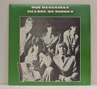 Front cover of the double vinyl album showing The Yardbirds, green background with band member portraits in black and white.