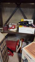 Wagner Hot Air Tool, Wen Engraver, and boxed items on shelf.
