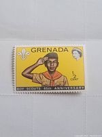 Front view of the Grenada Boy Scouts 65th Anniversary stamp showing its design and condition.