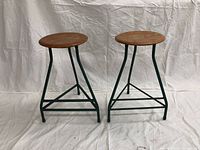 Front-facing view of both stools side by side against a white background