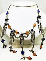 Front view of the entire Tibetan silver choker with hanging elements and colored stones