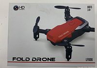 Top view of the box showing red foldable drone with HD camera and 'Fold Drone LF606' label.