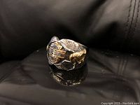 Front angled view of Harley Davidson ring showing logo and eagle accents.