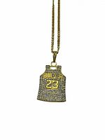 Front view of gold-tone necklace pendant shaped like a basketball jersey with 'BULLS 23' in clear rhinestones.