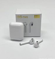 White i9S-TWS wireless earbuds with charging case, shown with product box behind them.