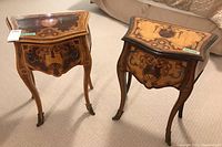 Front view of both tables side by side showing contrasting veneer patterns, drawers and cabriole legs.