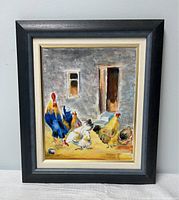 Full view of original oil painting showing rooster and hens in barnyard scene with a gray wall, window, door, and yellow ground. Painting is framed in black wood with ivory and gold accents.