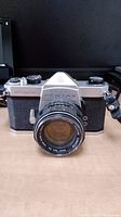 Front view of Asahi Pentax Spotmatic camera with lens attached, showing brand and model markings.