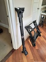 Full view of the 46-inch vehicle roof rack and detached mounting hardware.