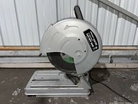 Side view of Chicago Electric 14-inch Industrial Cut-Off Saw showing blade and base plate.