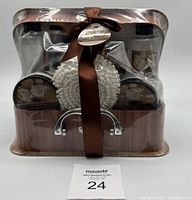 Photo of Ashley & Foster Coconut Oil Bath Gift Set in decorative box with ribbon and clear cover