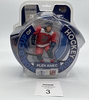 Front view of the Plekanec Czech Republic hockey figure in sealed packaging showing player in full gear with 'World Cup of Hockey 2016' labeling.