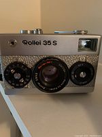 Front view of Rollei 35 S showing model name, Sonnar lens and controls