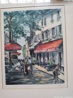 Close-up image of the framed vintage artwork showing a street scene with restaurant sign 'Baron Restaurant EUGENE', figures, trees, and a donkey.