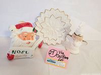 Overview of all three items together: Santa candleholder, snowflake plate, praying angel soap dispenser